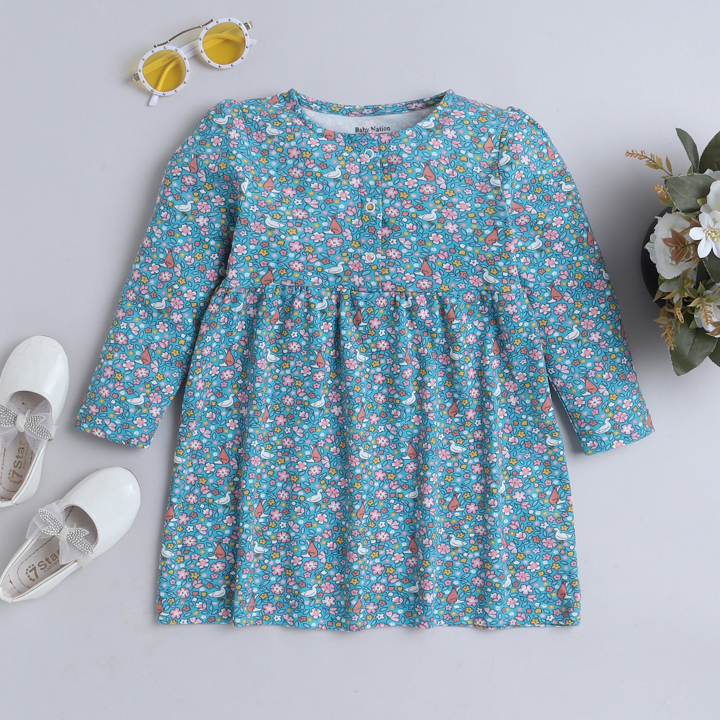 Baby Nation girls full sleeve cotton floral dress in blue - front view