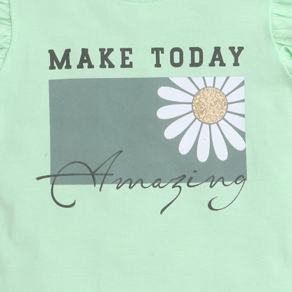 Mint green shirt with a daisy and text 'MAKE TODAY Amazing' on a light green background